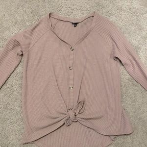 Beige pinkish color long sleeve tie in the front blouse.